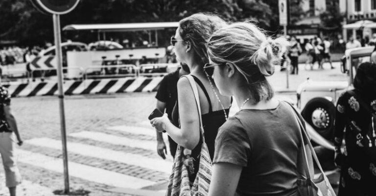 Walking Tours - Grayscale Photo of People Walking on The Street