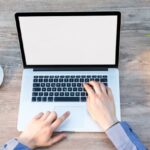 Film Screenings - Person's Hand on Laptop