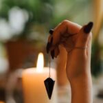 Magic Shows - Crop fortune teller with amulet during divination process