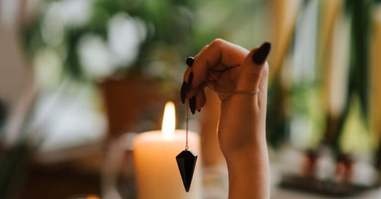 Magic Shows - Crop fortune teller with amulet during divination process