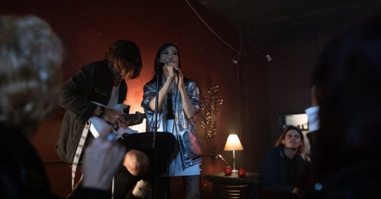 Karaoke Bars - A Woman Singing on Stage