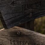 Hiking Trails - A wooden sign with two different directions on it