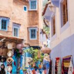 Souvenirs - A narrow alley with blue and white buildings