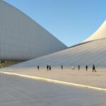 Cultural Centers - Photo of People Walking Near Building